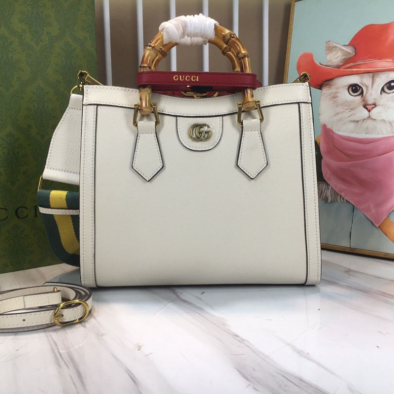 G*u*i shopping bags